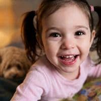 A child's photograph used as the source for a personalised Almia storybook